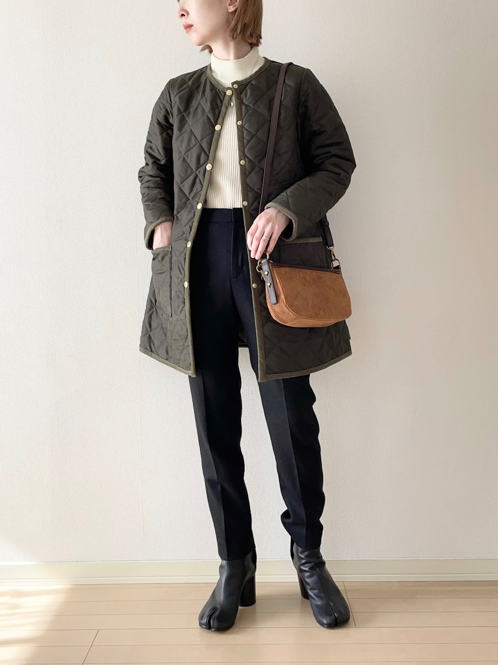 「Traditional Weatherwear、トラディショナルウェザーウェア、TWW、キルティングジャケット、ハイネックニット、テーパードパンツ、ショートブーツ、足袋ブーツ、Fossil、FOSSILSTYLE、フォッシル、ショルダーバッグ、秋コーデ、冬コーデ」｜「Traditional WeatherwearのARKLEY MIDDLE（その他アウター、グリーン系）」を使った、𝐀𝐍𝐘さん（レディース・156cm）の秋コーディネートの1枚目の写真