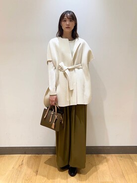 「アイテム（ポンチョ）」を使った、イケダさん（レディース・166cm）の冬コーディネート