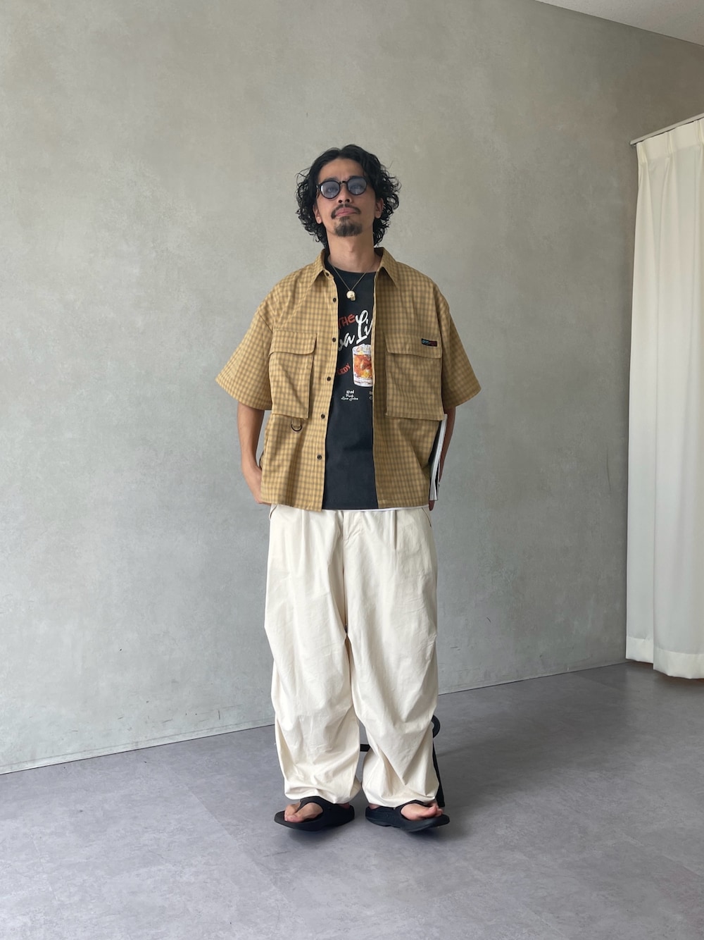 Genki Nakamuraさんの「デタッチャブルチェックフィッシングシャツ（CPCM）」を使ったコーディネートの1枚目の写真