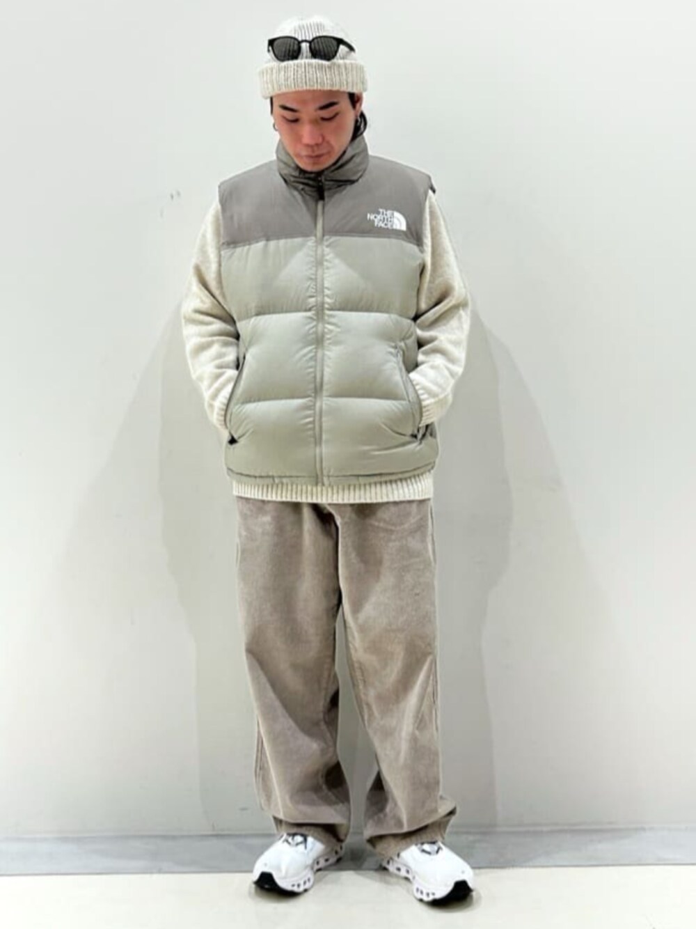 THE NORTH FACEのダウンベスト（グレー系）を使った人気