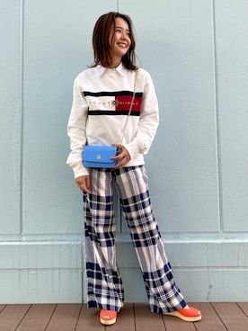 「TOMMY HILFIGER（トミーヒルフィガー）のアイテム」を使った、公式TOMMY HILFIGERさん（レディース・160cm）の春コーディネート