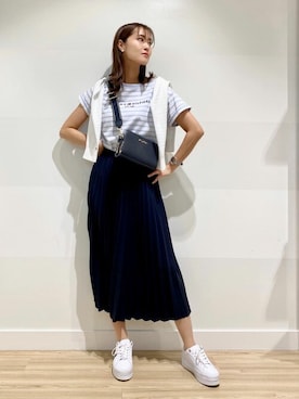 「TOMMY HILFIGER（トミーヒルフィガー）のアイテム」を使った、公式TOMMY HILFIGERさん（レディース・166cm）の春コーディネート