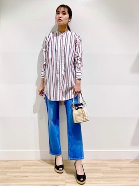 「TOMMY HILFIGER（トミーヒルフィガー）のアイテム」を使った、公式TOMMY HILFIGERさん（レディース・166cm）の春コーディネート