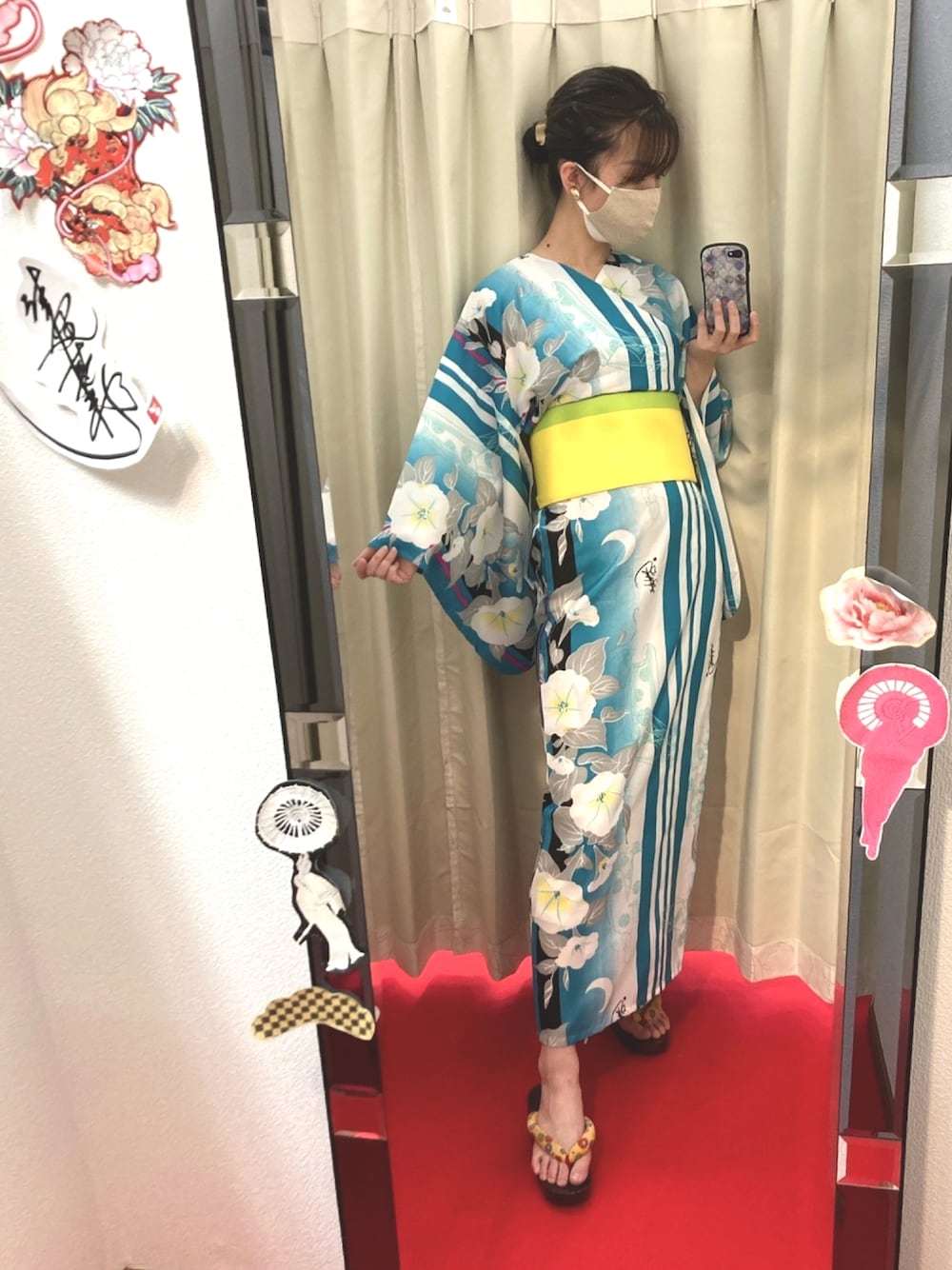 グリーン系の浴衣を着用したレディースの夏コーディネートの1枚目の写真