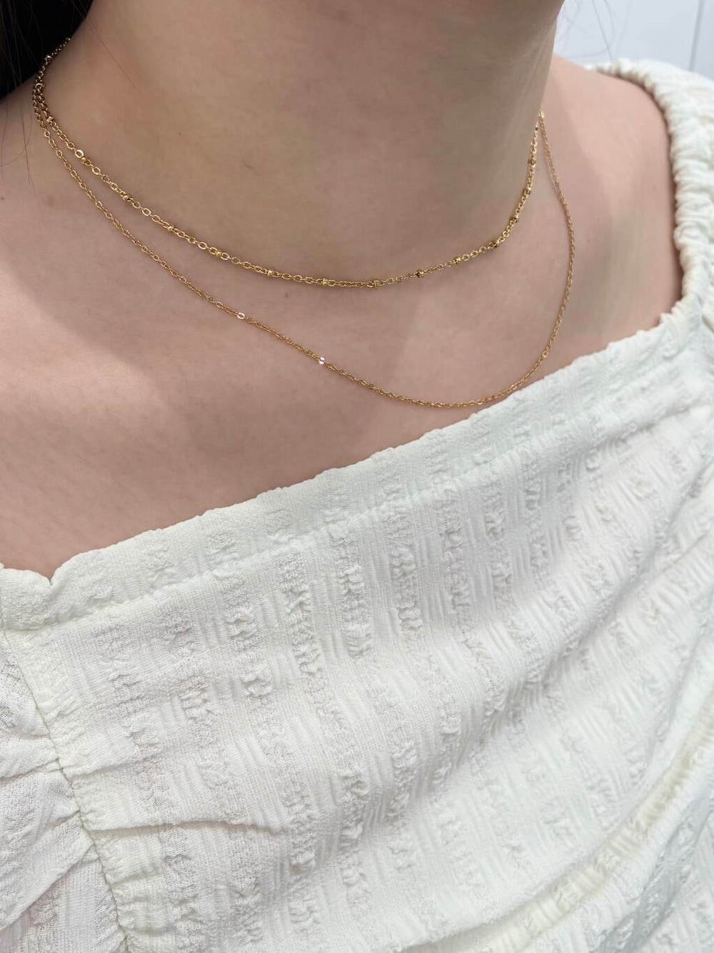 「シルバーアクセ、ネックレス、イヤリング、リング、アクセサリー、シルバーアクセサリー、ゴールドアクセサリー、アクセ、ブレスレット、ゴールドアクセ、フープイヤリング、チェーンブレスレット、セットリング、サージカルステンレス、ステンレス」｜「SMELLYのステンレスミニボール2レイヤードネックレス（ネックレス、ゴールド系）」を使った、　　Rinaさん（レディース・158cm）の夏コーディネートの1枚目の写真