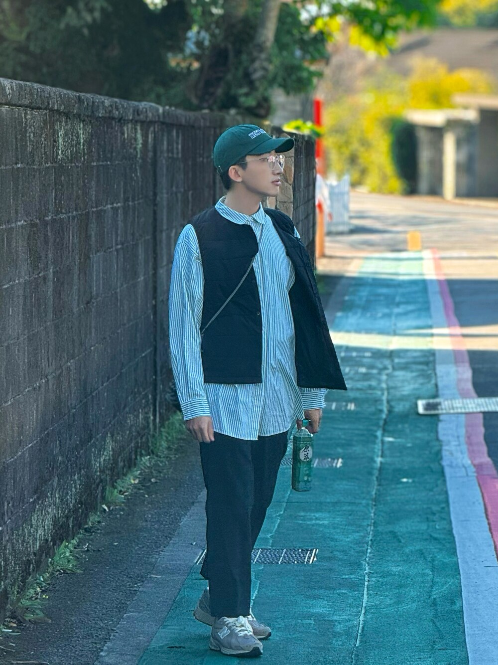 「winter、秋冬コーデ、冬アウター、Taiwan」｜「GUのアイテム（ダウンベスト、ブラック系）」を使った、Bertram.styleさん（メンズ・169cm）の秋コーディネートの1枚目の写真