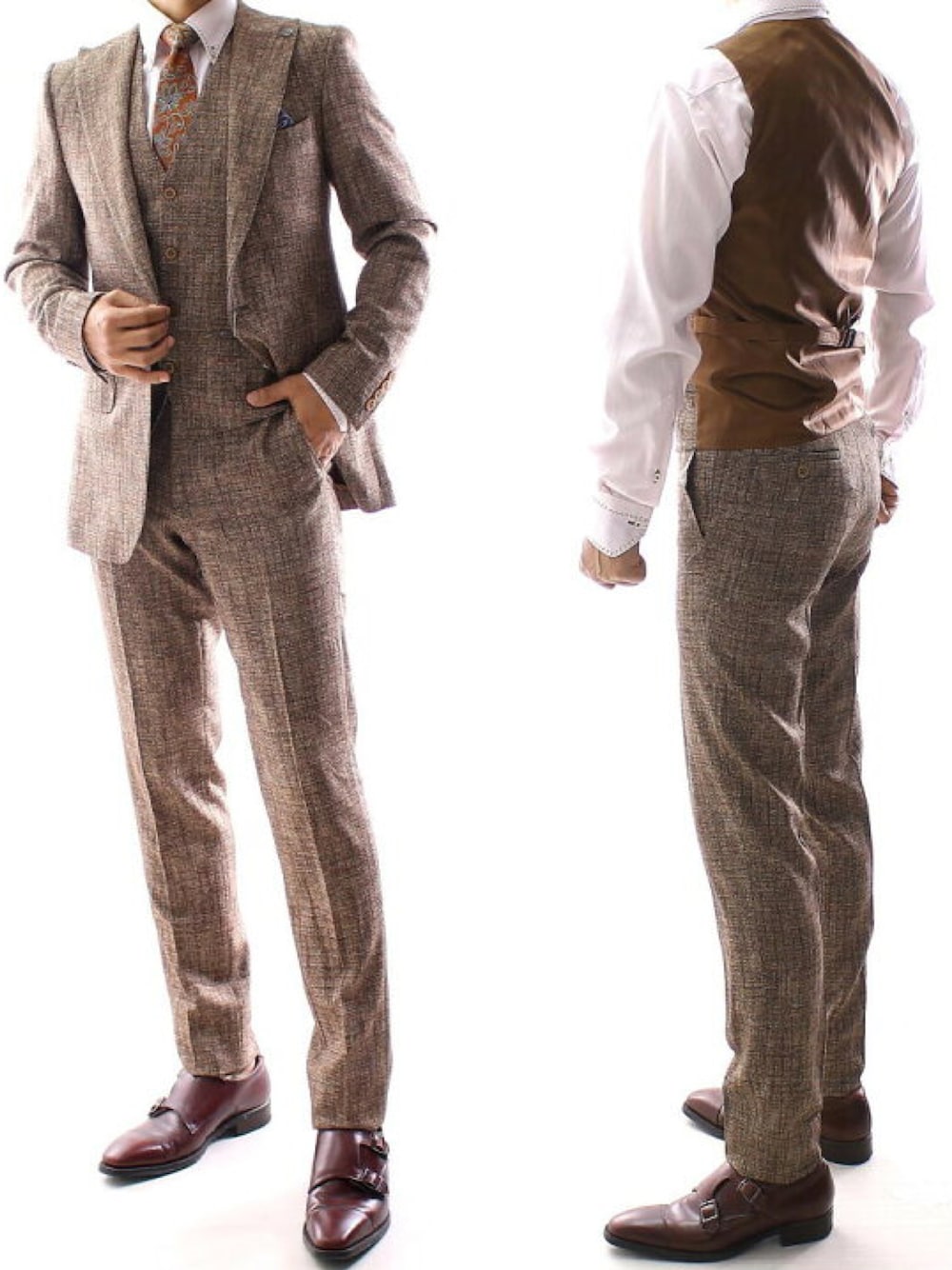 ブラウン系のスーツセットを着用したメンズの冬コーディネートの1枚目の写真