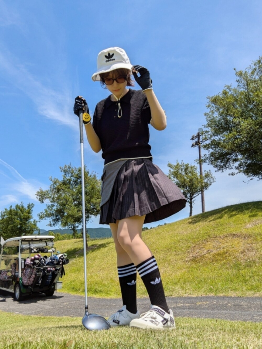 ゴルフグッズを使った「プリーツスカート」の人気ファッション
