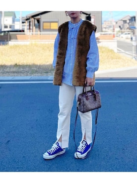 COACHのボストンバッグ（ブラウン系）を使った人気ファッション