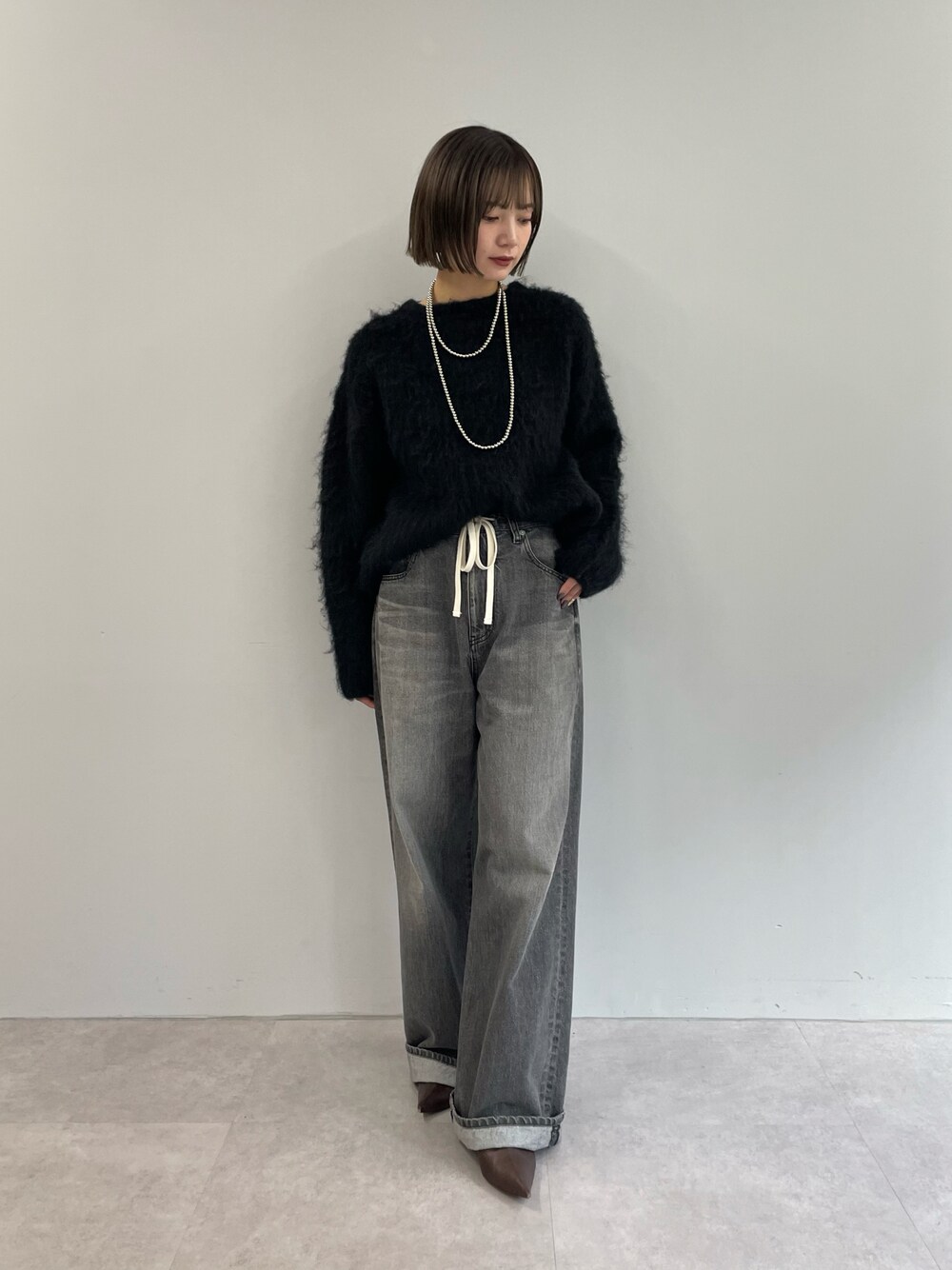 Whim Gazette（ウィムガゼット）の「ミックスヤーンクルーネック