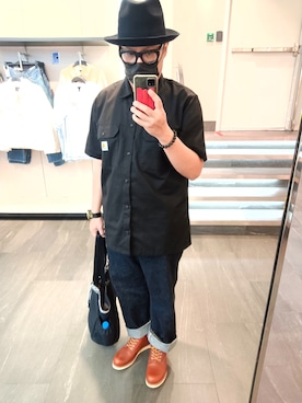 何子立さんのコーディネート