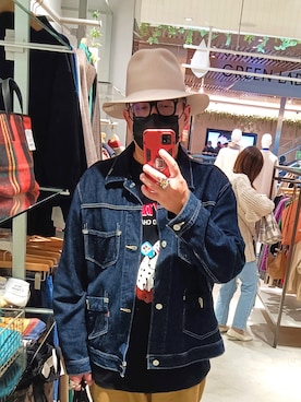 何子立さんのコーディネート