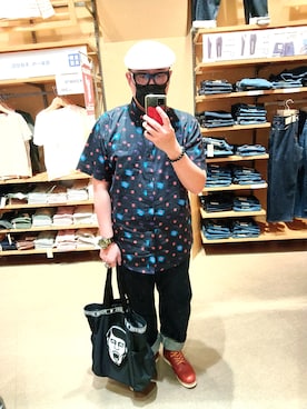 何子立さんのコーディネート