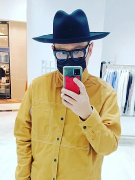 何子立さんのコーディネート