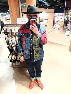 何子立さんのコーディネート