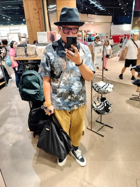 何子立さんのコーディネート