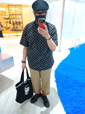 何子立さんのコーディネート