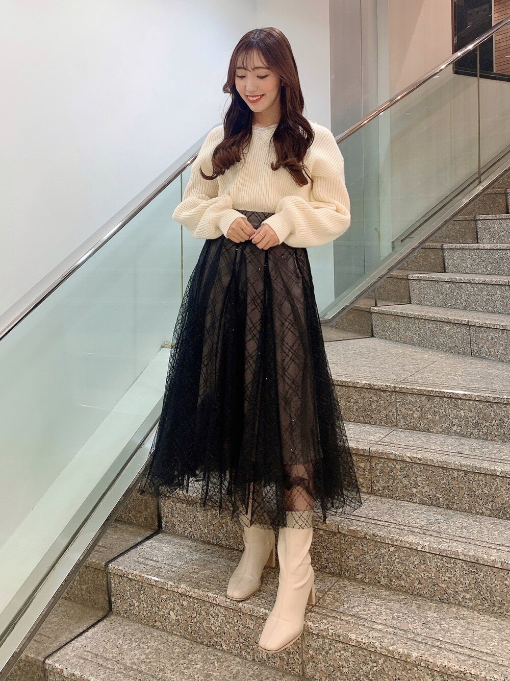 「dazzlinのスパンコールチュールチェックスカート（スカート、ブラック系）」を使った、airiさん（レディース・160cm）の冬コーディネートの1枚目の写真