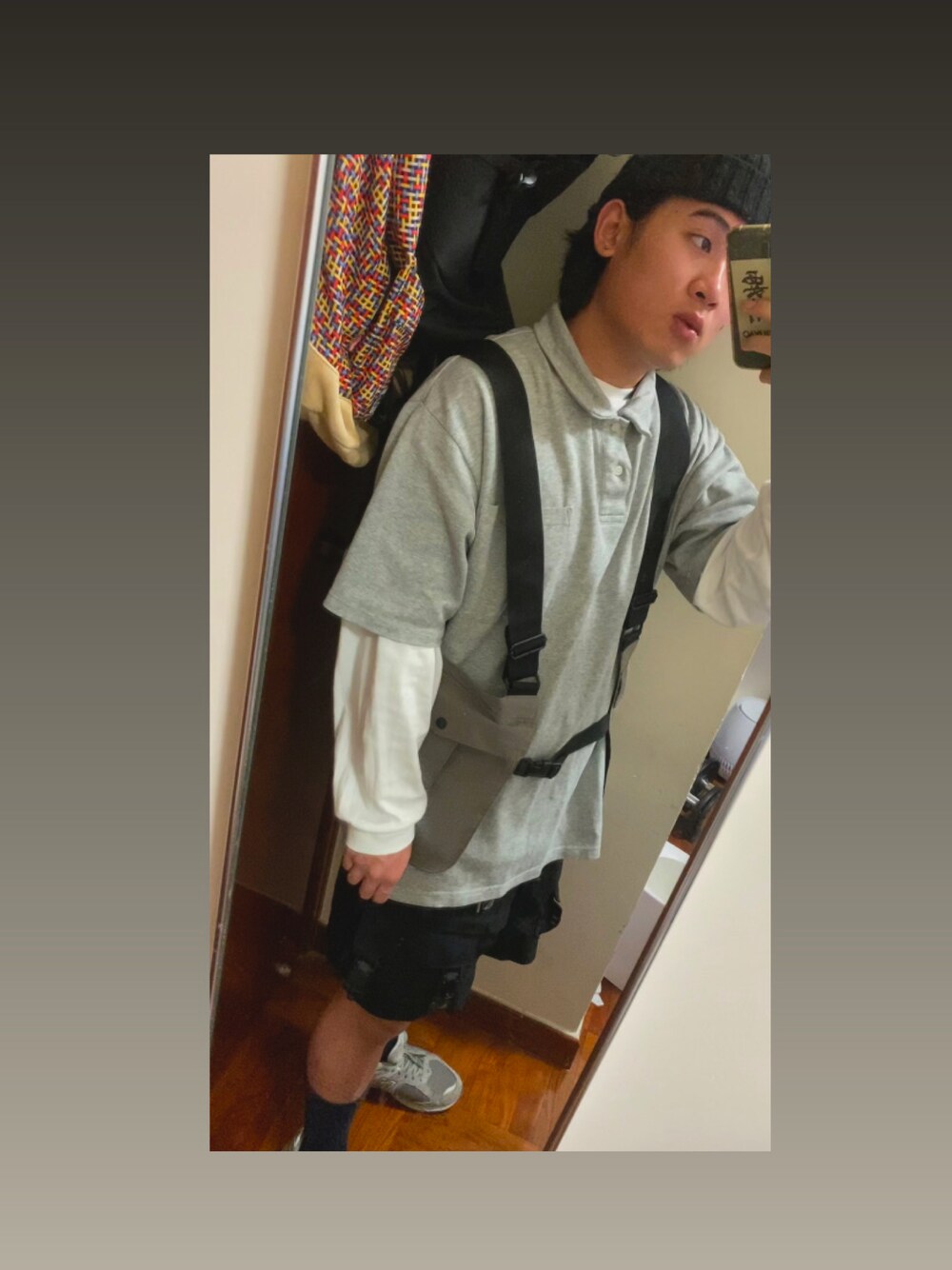 「Hong Kong」｜「GUのアイテム（その他アウター、グレー系）」を使った、Jason Lamさん（メンズ・174cm）の冬コーディネートの1枚目の写真