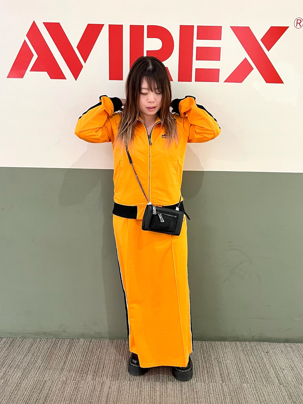 ジャージ（オレンジ系）を使った「セットアップ」の人気ファッション