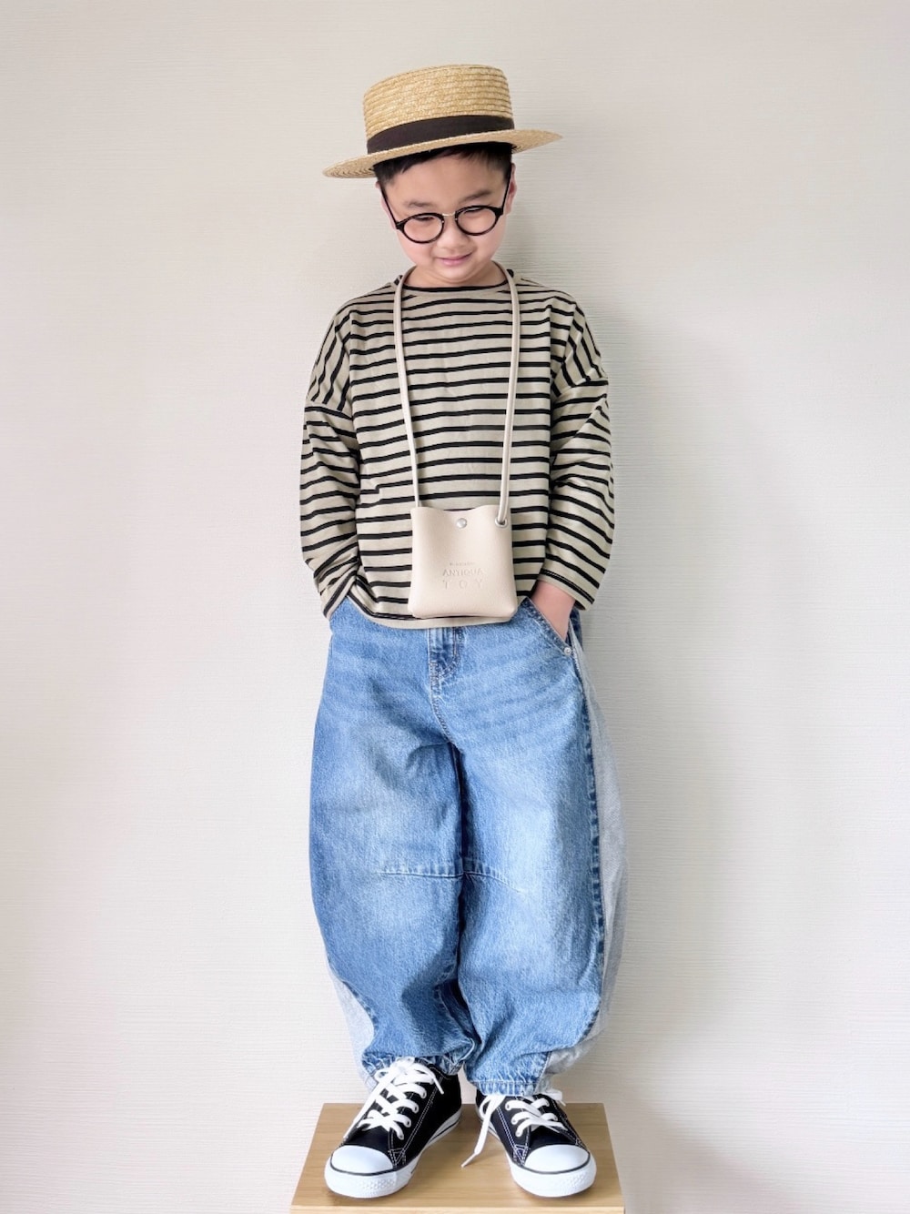 「春めき満開コーデ、春色、春コーデ、キッズコーデ、プチプラ、ロンT、カジュアルコーデ、キッズファッション、休日スタイル、オトナカジュアル、ボーダー、ナチュラル、カジュアル、デニム、むぎわら帽子」｜「ALBERO PITTIのﾎﾞｰﾀﾞｰﾌﾟﾙｵｰﾊﾞｰTｼｬﾂ（Tシャツ/カットソー、ブラック系）」を使った、yo_yoさん（キッズ・127cm）の春コーディネートの1枚目の写真