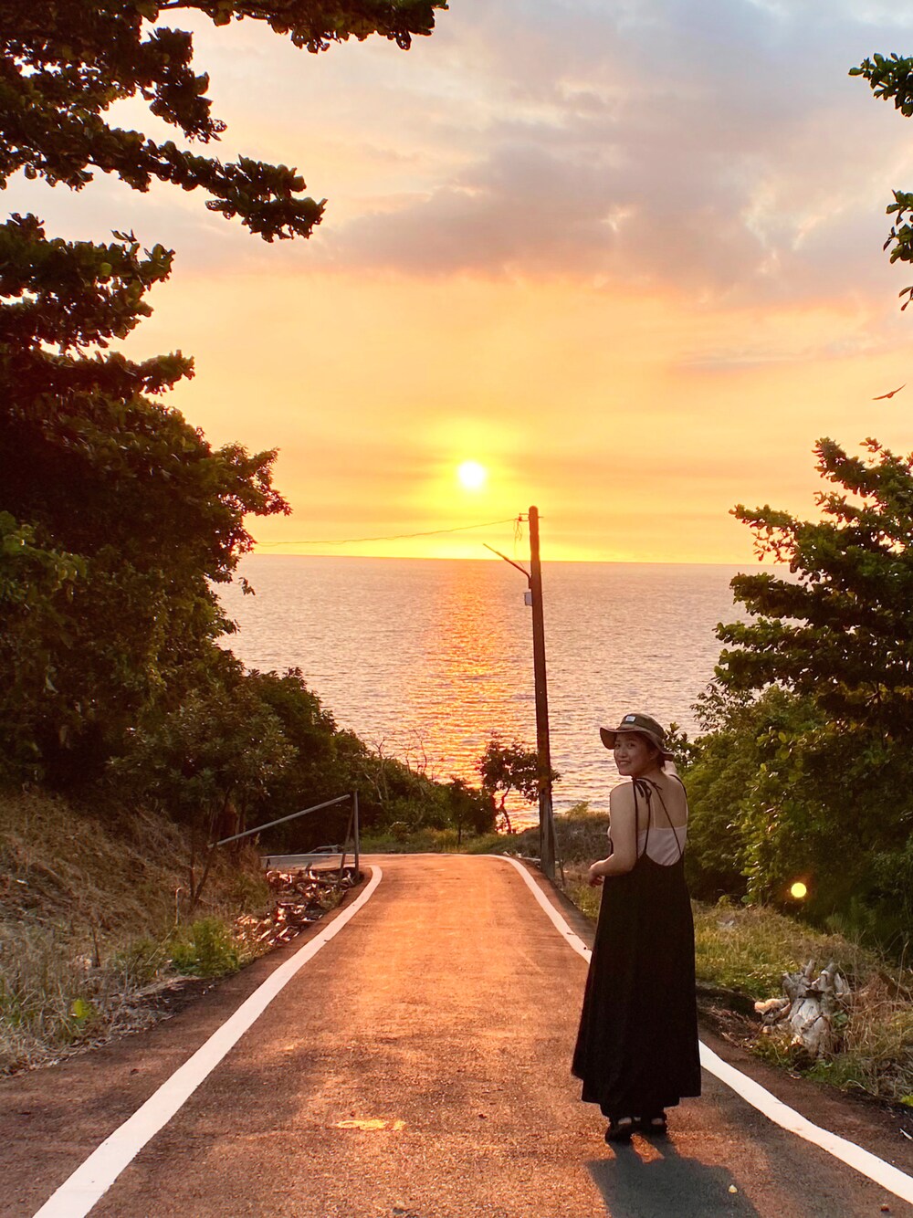 「sunset、夏、海」｜「NETのアイテム（スカート、ブラック系）」を使った、April Wuさん（レディース・165cm）の夏コーディネートの1枚目の写真