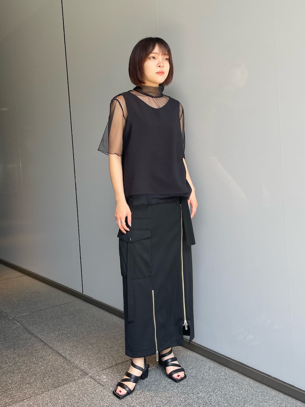 「綺麗めカジュアル、ブラックコーデ、シアートップス、スカートスタイル、春コーデ、夏コーデ」｜「UNITED TOKYOのシアーコンビハイネックブラウス（シャツ/ブラウス、ブラック系）」を使った、ai2o3さん（レディース・163cm）の春コーディネートの1枚目の写真