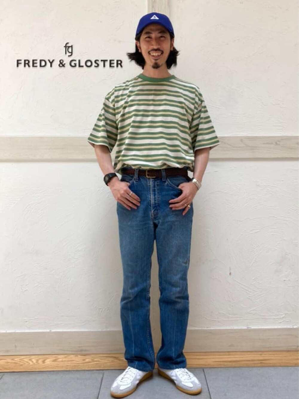 「FREDY&GLOSTER、フレディアンドグロスター、gloster、メンズコーデ、ボーダー、タックイン、デニム、帽子、休日スタイル、ゆるコーデ、Ｔシャツ、シンプル、爽やかコーデ、古着MIX、ユニセックス」｜「GLOSTERの【GLOSTER/グロスター】ヴィンテージ加工 OLDボーダーTシャツ（Tシャツ/カットソー、グリーン系）」を使った、GLOSTER stylingさん（メンズ・175cm）の夏コーディネートの1枚目の写真