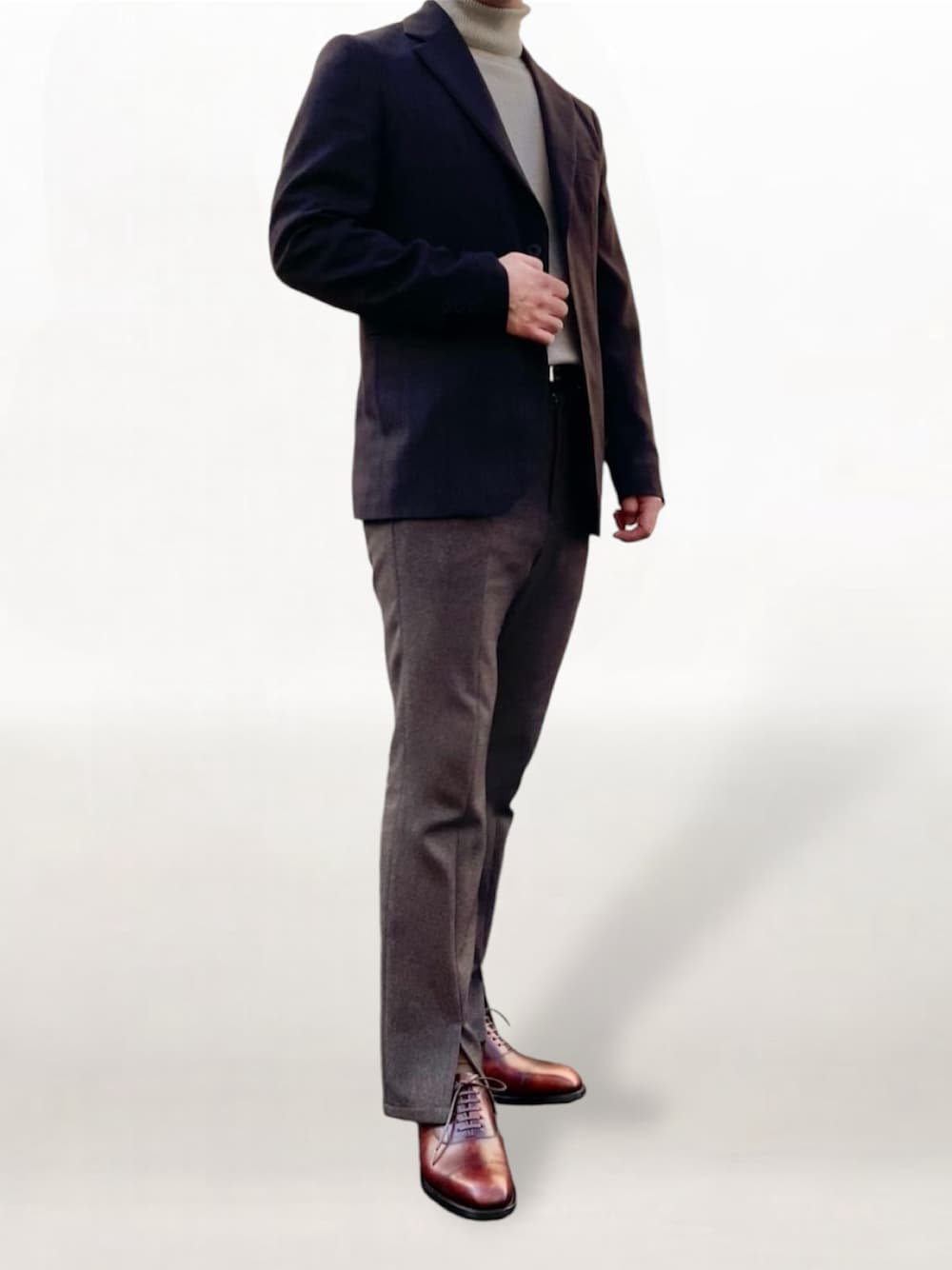ブラウン系のテーラードジャケット、ブラウン系のその他パンツ、ブラウン系のドレスシューズを着用したメンズの秋コーディネートの1枚目の写真