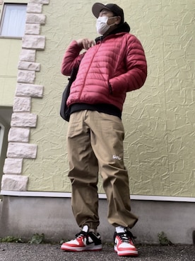 「アイテム（ダウンジャケット/コート、レッド系）」を使った、5510さん（メンズ・179cm）の冬コーディネート