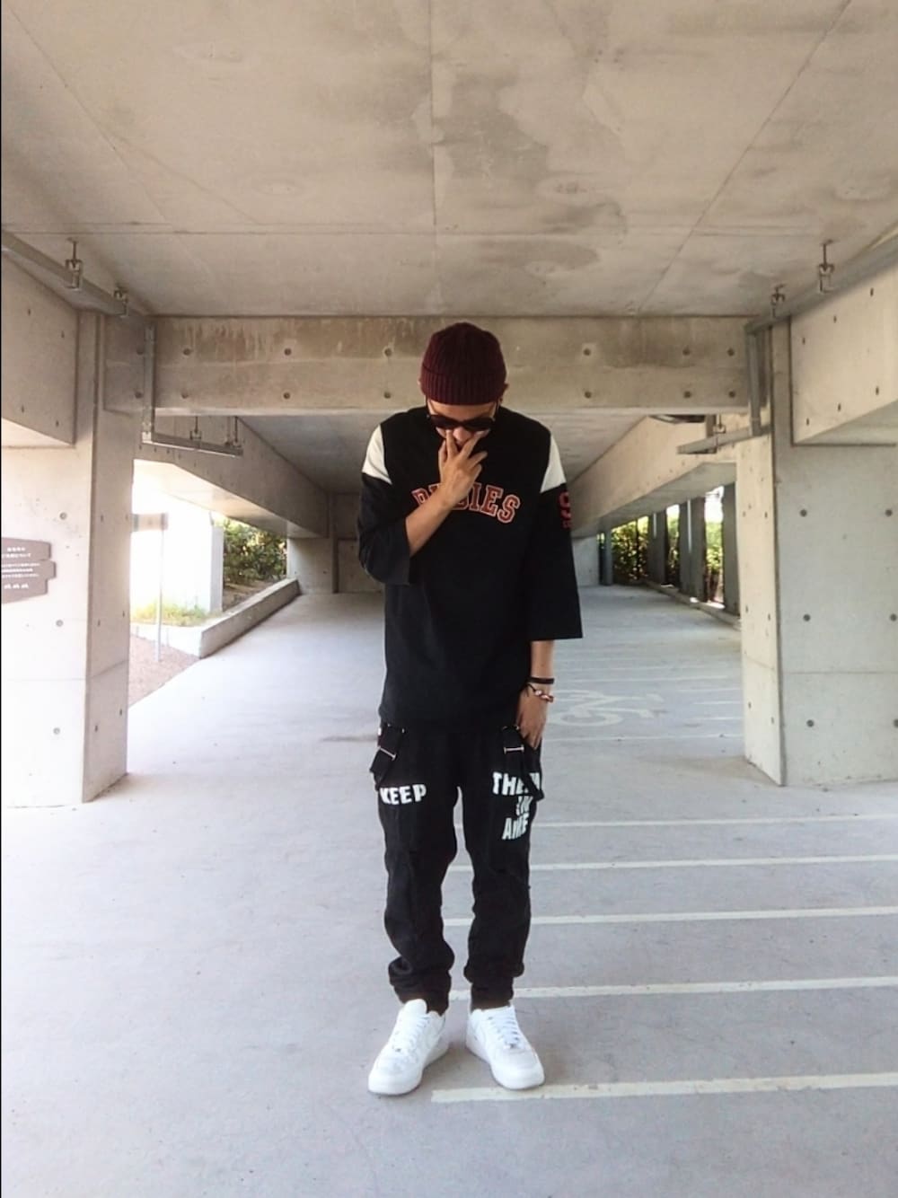 「bmx、ストリート、モトクロスシャツ、夏コーデ、RUDIES、サロペット、オーバーオール、NIKE、ニット帽、サングラス、evae mob、ラフコーデ、イスラムワッチ」｜「RUDIESのアイテム（Tシャツ/カットソー、ブラック系）」を使った、hasshi(ハッシー)さん（メンズ・172cm）の夏コーディネートの1枚目の写真