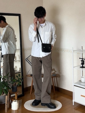 「MHL.（エムエイチエル）のアイテム」を使った、市川 昇さん（メンズ・169cm）の春コーディネート