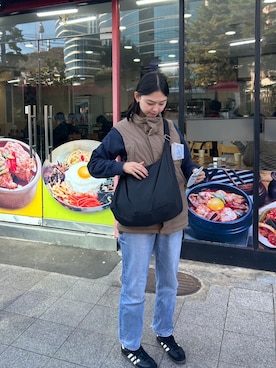 「アイテム（ダウンベスト）」を使った、👽さん（レディース・167cm）の秋コーディネート