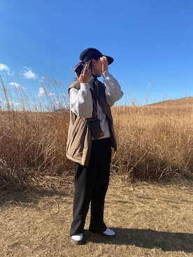 「アイテム（ダウンベスト、ブラウン系）」を使った、👽さん（レディース・167cm）の冬コーディネート