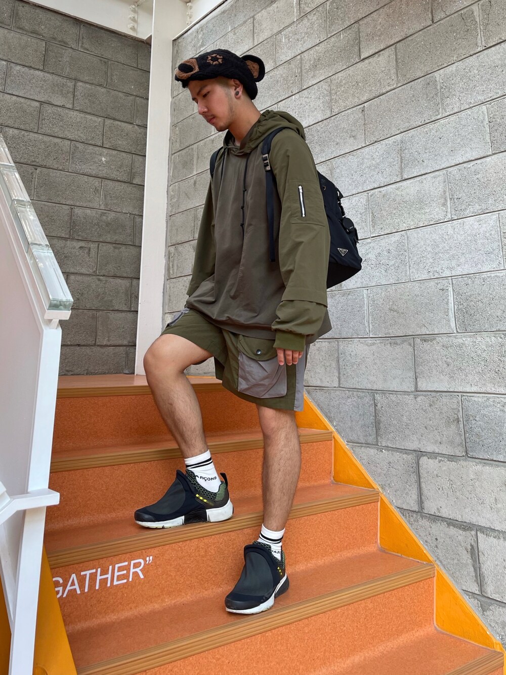 「FUSIO FUSIO、doublet、COMME des GARCONS HOMME PLUS、NIKE、PRADA」｜「COMME des GARCONSのアイテム（スニーカー、ブラック系）」を使った、浮生 ふせいさん（メンズ・169cm）の冬コーディネートの1枚目の写真
