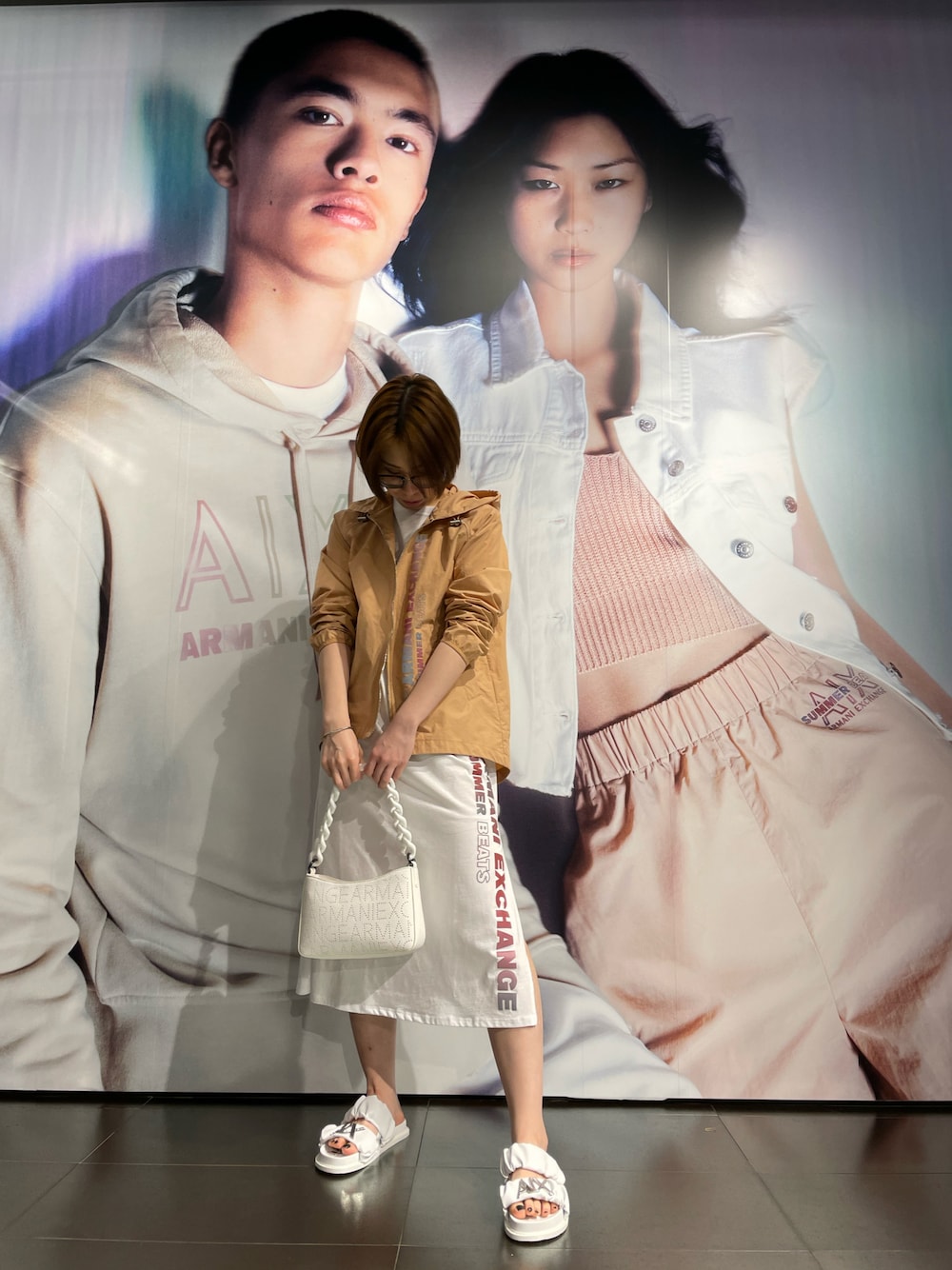 「春夏コーデ、カジュアルコーデ、シンプルコーデ、夏コーデ、楽チンコーデ、夏フェス、サンダル、AXchanger、armaniexchange」｜「ARMANI EXCHANGEの【A|X アルマーニ エクスチェンジ】SUMMER BEATS　ナイロンジャケット（ナイロンジャケット、ベージュ系）」を使った、K.MOEさん（レディース・155cm）の春コーディネートの1枚目の写真