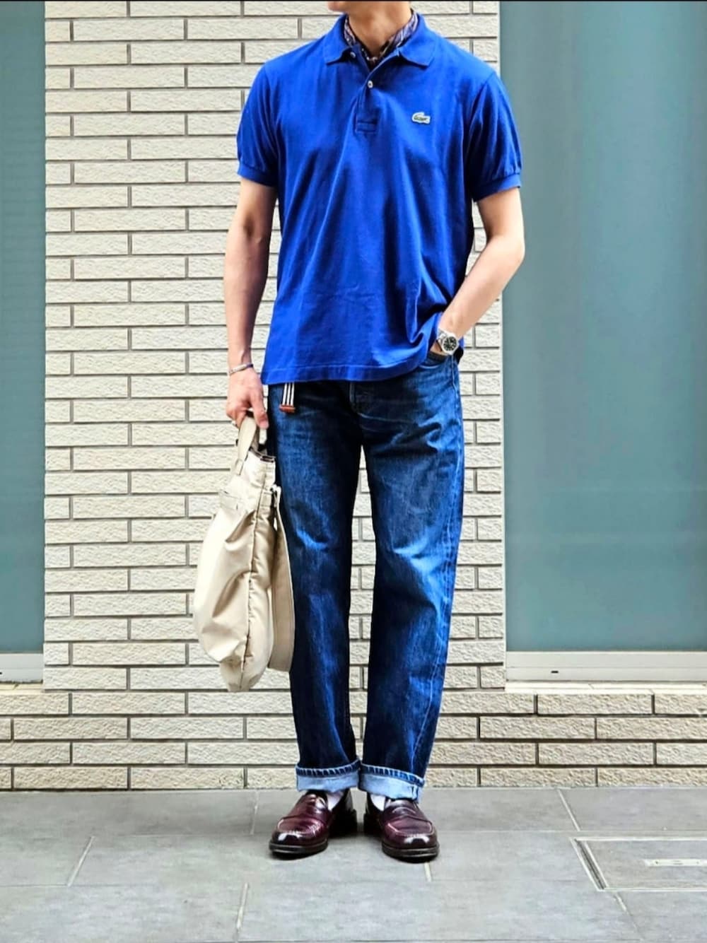 「きれいめカジュアル、夏コーデ、大人カジュアル、今日のコーデ、休日コーデ、501、リーバイス、ネッカチーフ、オールデン、バッグ、初老のこうでねぇと」｜「LACOSTEのLACOSTE L1212 ロイヤルブルー USED （ポロシャツ、ブルー系）」を使った、D・BLUEさん（メンズ・170cm）の夏コーディネートの1枚目の写真