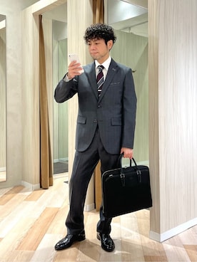 「アイテム（ビジネスバッグ）」を使った、URAさん（メンズ・165cm）の冬コーディネート