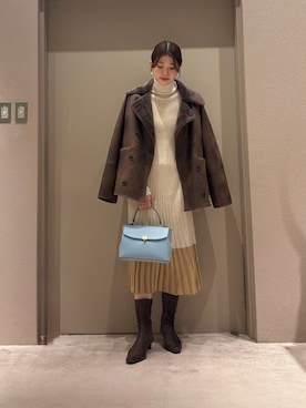 「アイテム（ムートンコート）」を使った、Mila Owenさん（レディース・169cm）の冬コーディネート