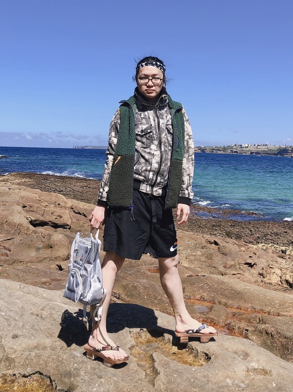「beach、NIKE、NIKEACG、oribagu」｜「NIKEのアイテム（その他アウター、グリーン系）」を使った、李瑞可さん（メンズ・170cm）の春コーディネートの1枚目の写真