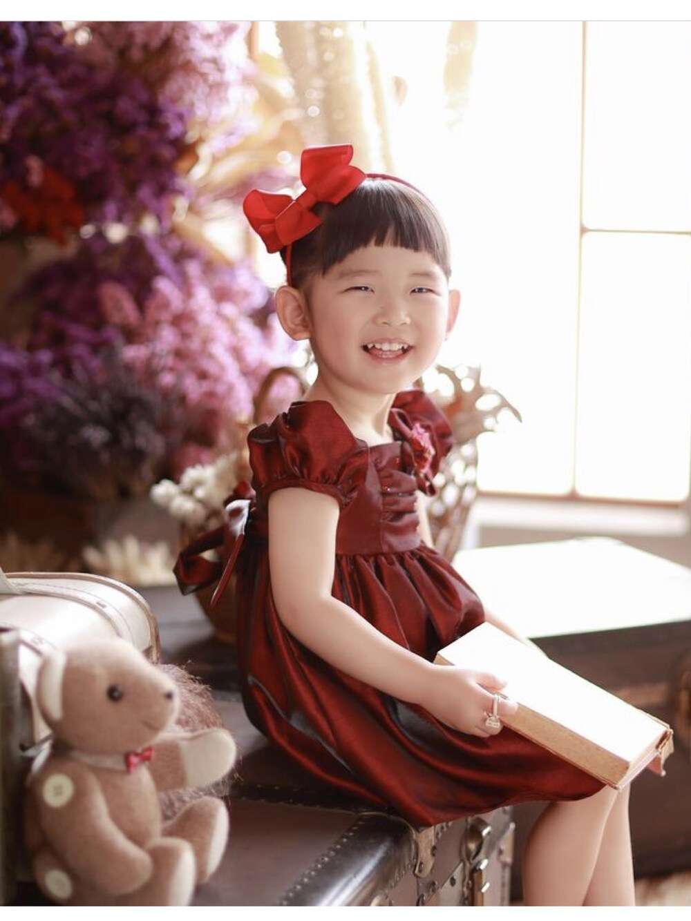 レッド系のその他を着用したキッズの春コーディネートの1枚目の写真