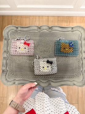 「LOWRYS FARM（ローリーズファーム）の【サンリオキャラクターズ】ビーズポーチ 651908/GOODS（カードケース、ブラウン系）」を使った、ローサさん（レディース）の春コーディネート