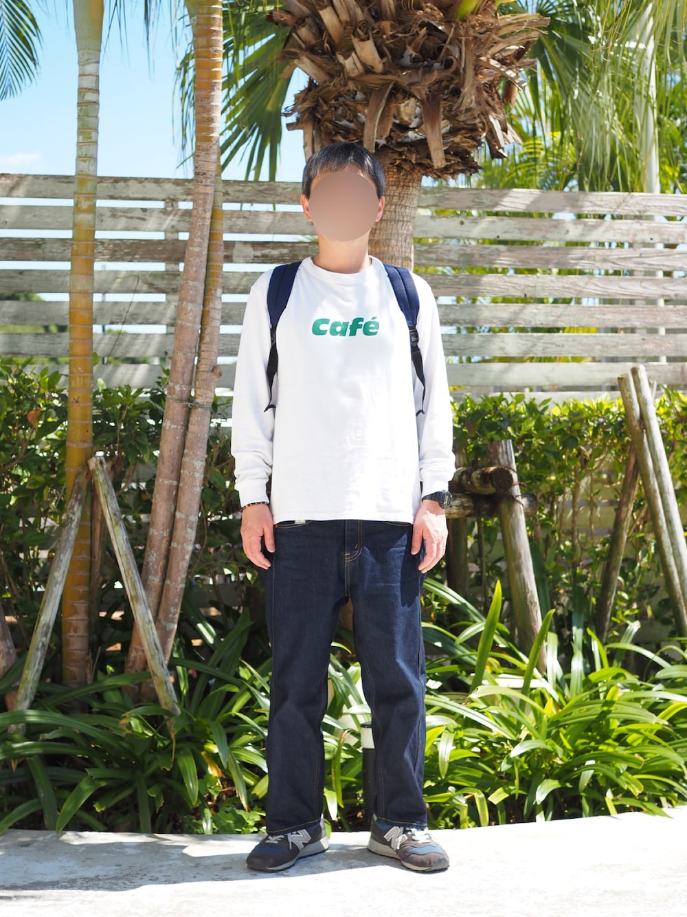 「TANG TANG、JUNYA WATANABE MAN、Levi's、505、New Balance、N.HOOLYWOOD、PORTER、JAM HOME MADE、CASIO、リュック、ロンT、プリントTシャツ、ゆるコーデ、スニーカーコーデ、春めき満開コーデ」｜「TANGTANGのアイテム（Tシャツ/カットソー、ホワイト系）」を使った、Fさん（メンズ・169cm）の春コーディネートの1枚目の写真
