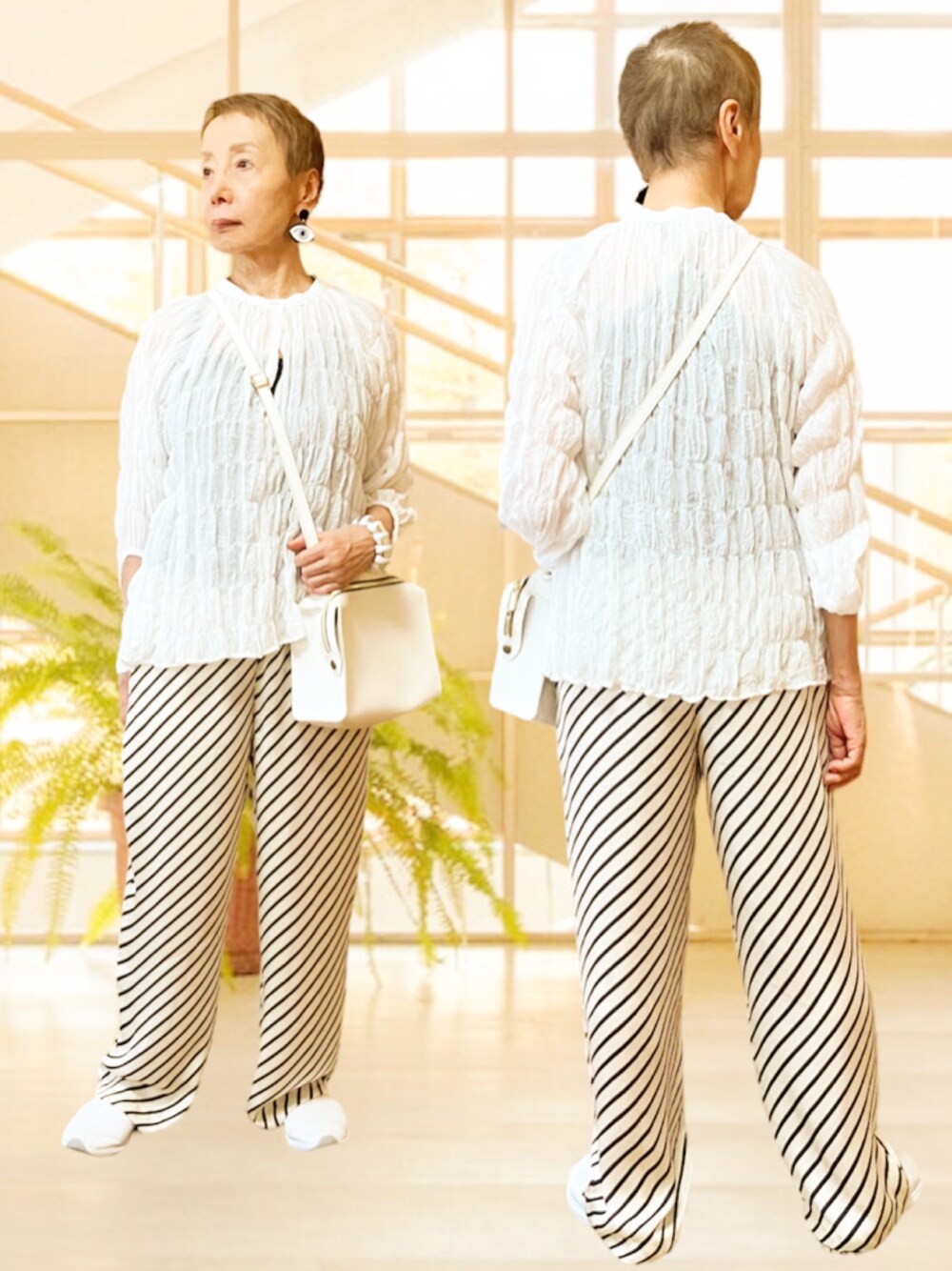 ホワイト系のシャツ/ブラウス、ホワイト系のスニーカーを着用したレディースの夏コーディネートの1枚目の写真