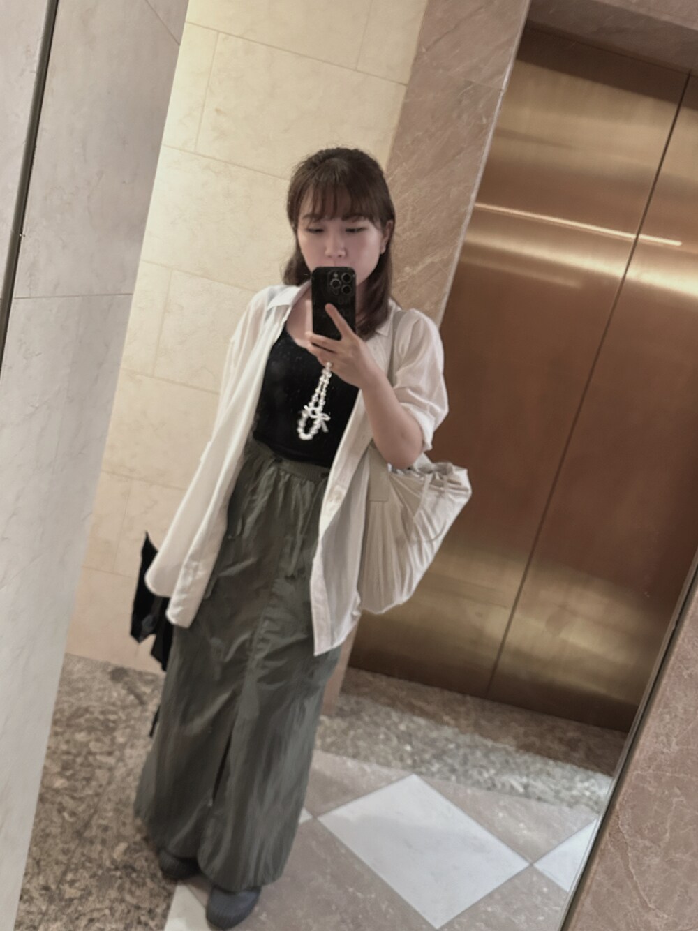 「UNIQLOのアイテム（クラッチバッグ、ベージュ系）」を使った、ねこさん（レディース・149cm）の秋コーディネートの1枚目の写真