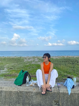 「アイテム（チノパンツ）」を使った、Kathy chiuさん（レディース・166cm）の春コーディネート