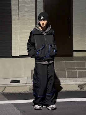 「a2o（エーツーオー）の【a2o】パイピングバギーナイロンパンツ（カーゴパンツ、ブラック系）」を使った、内緒の一郎さん（メンズ・167cm）の春コーディネート
