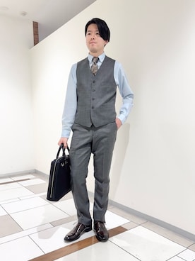 「アイテム（ビジネスバッグ）」を使った、及川さん（メンズ・170cm）の冬コーディネート