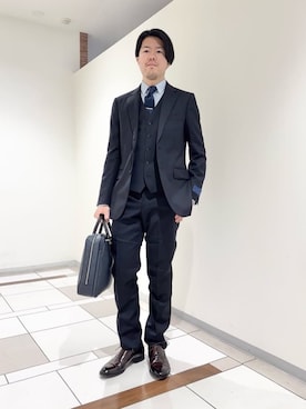 「アイテム（ビジネスバッグ）」を使った、及川さん（メンズ・170cm）の冬コーディネート