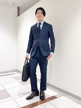 「アイテム（ビジネスバッグ）」を使った、及川さん（メンズ・170cm）の冬コーディネート